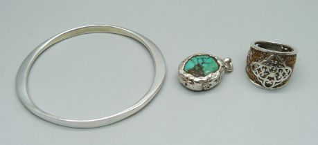 A hallmarked silver bangle, a turquoise pendant, (tests as silver) and a ring, O, (tests as silver