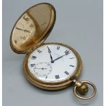 A 9ct gold full-hunter pocket watch, inner case 9ct gold, bears inscription dated 1928 and monogram,