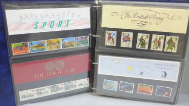 Stamps; an album of 1980s GB presentation packs (44)