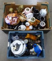 Two boxes of cat ornaments and plates including two cast iron doorstops **PLEASE NOTE THIS LOT IS