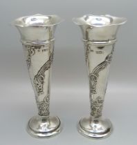 A pair of William Comyns vases, London 1904, 13cm, weighted