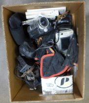 A box of cameras and Sharp and Sony camcorders **PLEASE NOTE THIS LOT IS NOT ELIGIBLE FOR POSTING