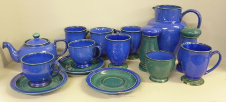 A box of blue Denby mugs, cups, large jug, teapot, salt and pepper pots, one mug and one saucer a/f