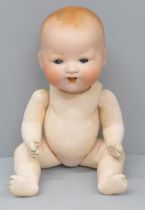 An Armand Marseille bisque head doll, 351/22K, circa 1860-1900 with composition body