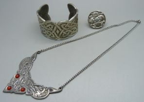 A St. Justin pewter necklace, a bangle and a ring