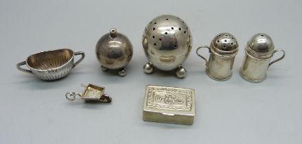A small hallmarked silver pepper, a hallmarked silver miniature sugar bowl, a miniature 925 silver