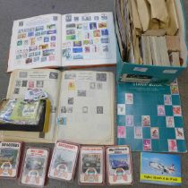 A collection of stamp albums, Top Trumps, Brooke Bond Tea cards, cigarette cards, etc.