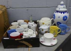 A collection of hand painted pottery, cups, mugs, salt and pepper pots, soap dispenser, teapot,