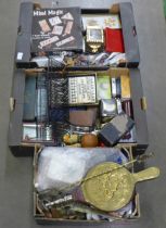 Three boxes of miscellaneous items, tins, Coronation china, plated cutlery, brass, tennis balls,
