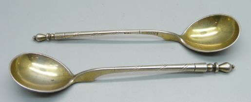 A pair of Russian 84 silver spoons, marked 1858, 50g