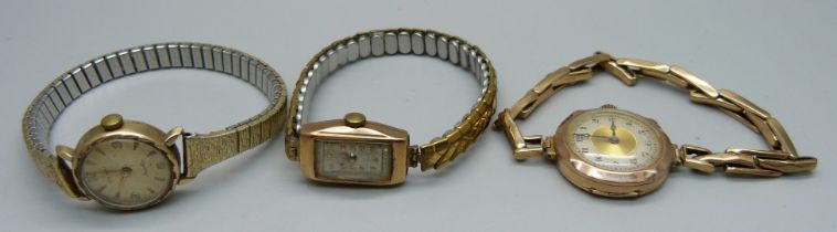 Three lady's 9ct gold wristwatches including one on an expanding 9ct gold bracelet