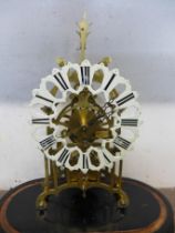 A brass fusee skeleton clock