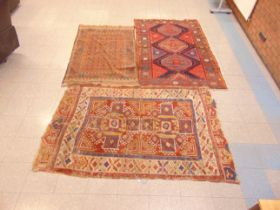 Three assorted eastern rugs, a/f
