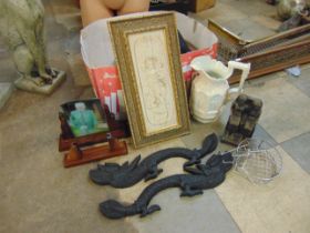 A box of assorted items, including an Art Nouveau brass vesta stand, a faux marble plaque, etc.