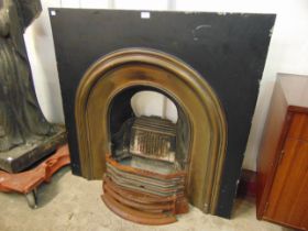 A Victorian cast iron fire surround