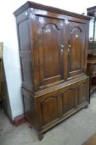 A George III oak housekeeper's cupboard (converted to a wardrobe)