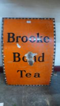 A vintage enamelled Brooke Bond Tea advertising sign