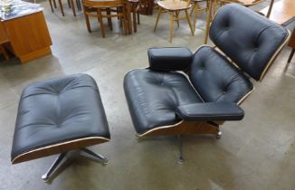 A Charles & Ray Eames style simulated rosewood and black leather revolving lounge chair and ottoman