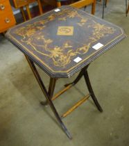A small French Art Nouveau beech folding table