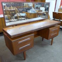 A G-Plan Fresco teak floating top dressing table