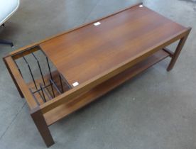 A teak coffee/magazine rack