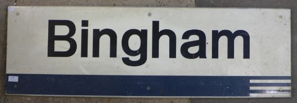 A metal Bingham railway sign