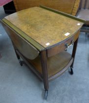 An Art Deco style burr walnut drop-leaf cocktail trolley