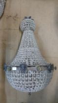 A large French Empire style bag shaped chandelier