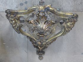 A French Rococo style cast ormolu wall bracket (lacking top)