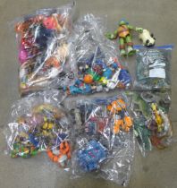 A box of mixed retro 1980s, 1990s, 2000s toys, Transformers, Ben10, He-Man, TMNT, action figures,