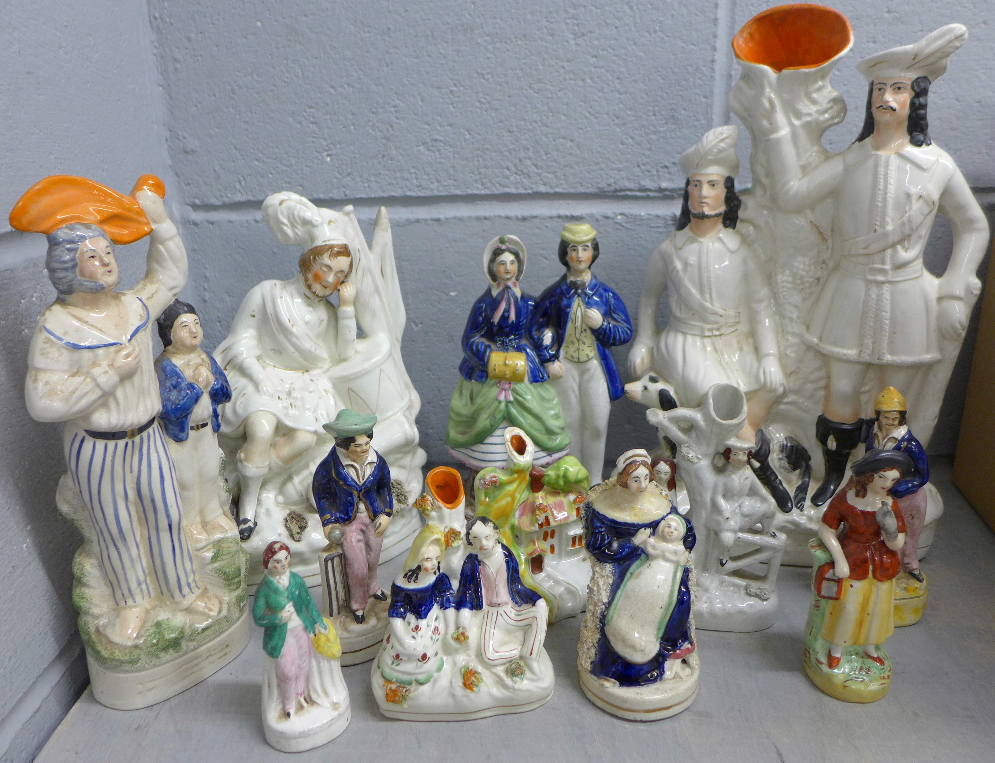 A collection of Staffordshire figures including a Robin Hood flatback, spill holders, small - Image 2 of 2