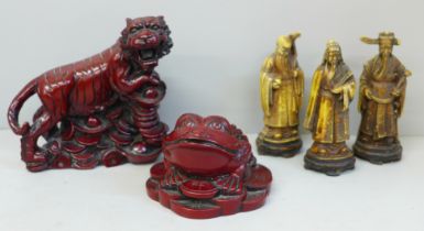 Two Cinnabar coloured resin figures, tiger and toad and three resin figures of Immortals, one a/f