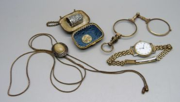 A lady's Omega de Ville wristwatch, a pair of plated lorgnettes, a silver thimble in miniature carry