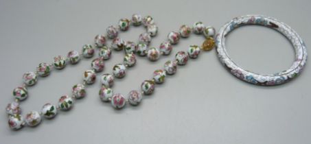 A cloisonne bead necklace and a bangle