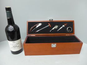 A bottle of Taylors Vintage Port 1983, with associated box