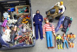 A box of mixed action figures, He-Man, Michael Jackson, Star Wars, etc.