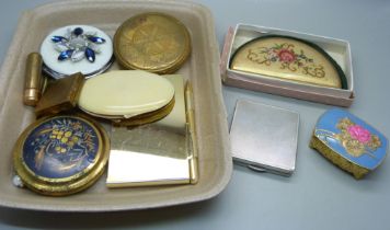 A collection of compacts and trinket boxes