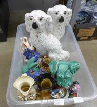 A pair of Staffordshire spaniels, two Toby jugs, two models of houses, a pair of miniature spaniels,
