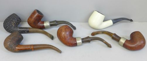 A collection of six pipes including three Petersons