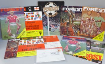 Football memorabilia; a Nottingham Forest selection including cover signed by Trevor Francis and