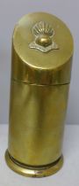 A brass trench art table lighter, 14cm