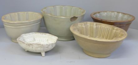 A collection of five late 19th/early 20th Century ceramic jelly/blancmange moulds