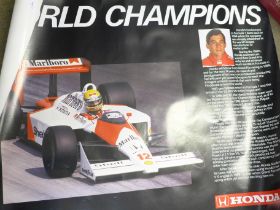 Four very large motorsport posters, (approximately 40 x 30"), two Honda World Champion Formula One