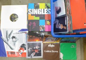 Twenty-four 12" singles and forty-six 7" singles with picture sleeves