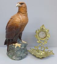 A Royal Doulton Whyte & Mackay Golden Eagle decanter and a gilt watch stand