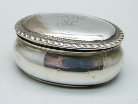 A silver oval box with hinged lid, initials to the lid, Birmingham 1896, 49g