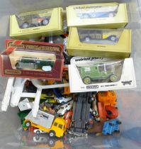 A box of mixed die-cast model vehicles, Dinky, Corgi, etc., and toy soldiers