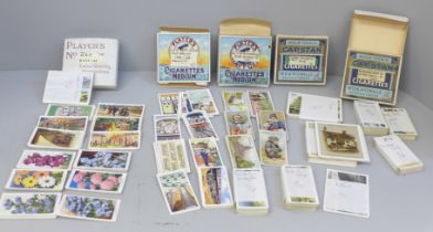 Cigarette card collections in five John Player cigarette boxes