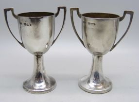 A pair of silver two handled trophies, London marks, 73g
