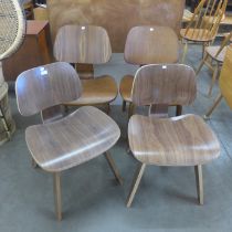 Four Eames style simulated rosewood bent plywood chairs